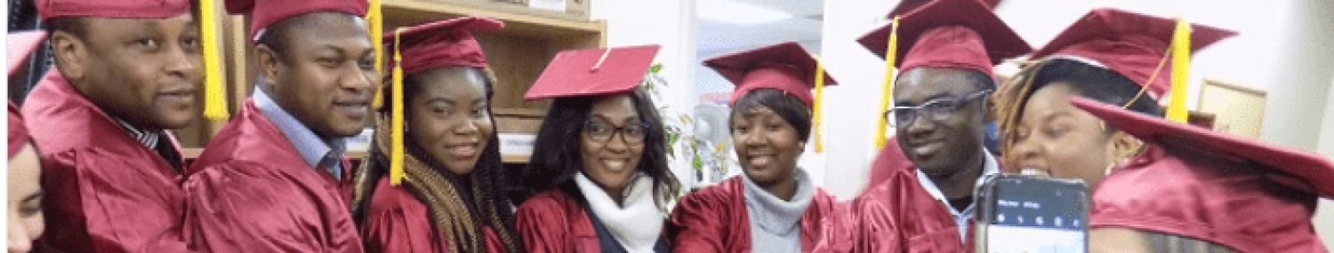 Graduates of the CLICK program Graduates of the CLICK program in cap & gown